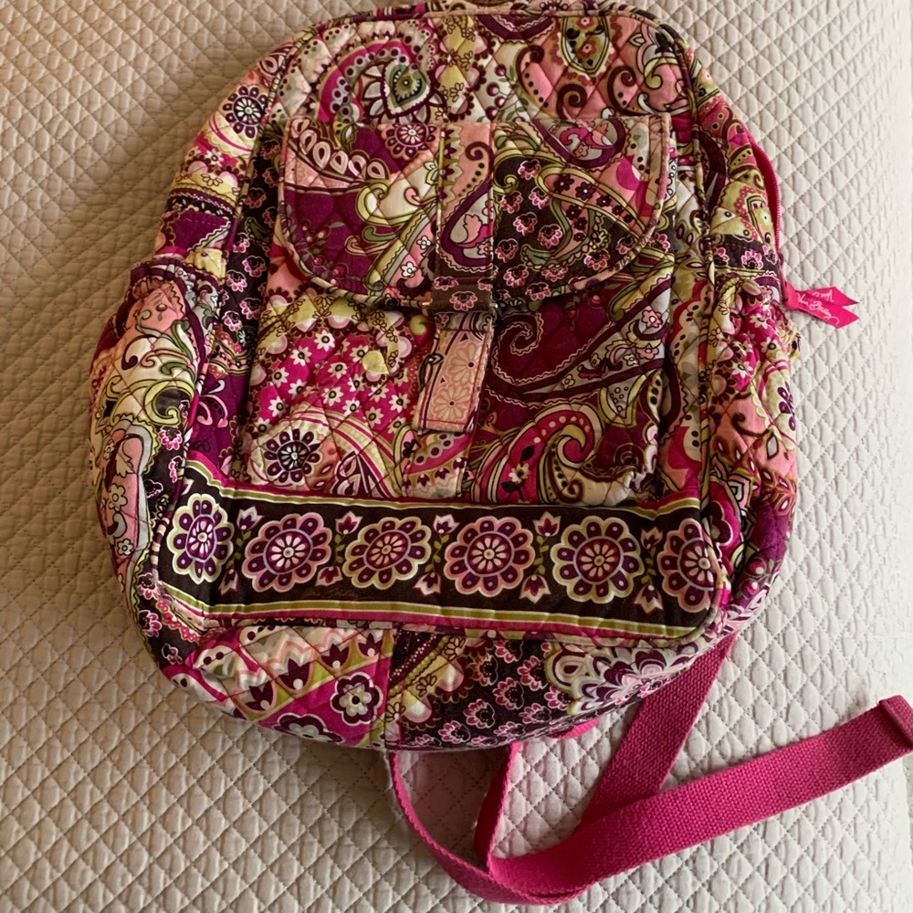 Vera Bradley back pack, and small clutch.